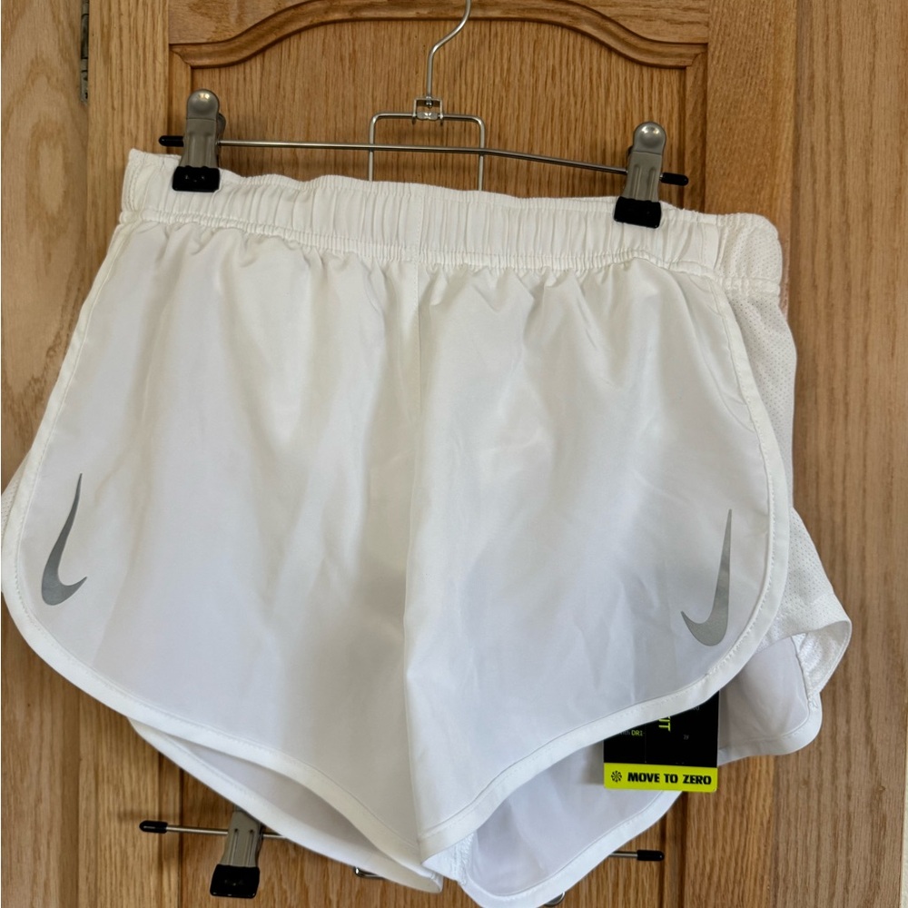 Nike Women's White Athletic Shorts with Gray Swoosh